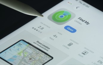 Dhaka, Bangladesh- 30 Oct 2025: Apple Find My app on a iPad screen with a pen pointing at the