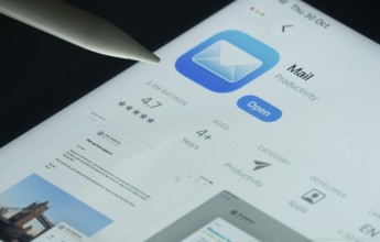 Dhaka, Bangladesh- 30 Oct 2025: Apple Mail app on a iPad screen with a pen pointing at the install