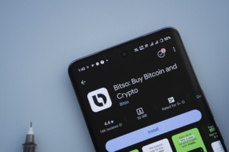 Dhaka, Bangladesh- 29 May 2025: On a blue surface, a smartphone displays the Bitso app within the