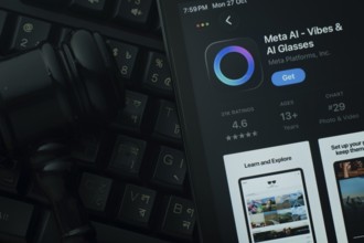 Dhaka, Bangladesh- 28 Oct 2025: An iPad displaying the Meta Ai app against a judge's gavel and dark