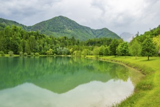 Landscape of Lake Elisabethsee on a rainy day in spring, Austria