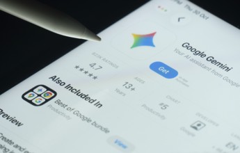 Dhaka, Bangladesh- 30 Oct 2025: Google Gemini app on a iPad screen with a pen pointing at the