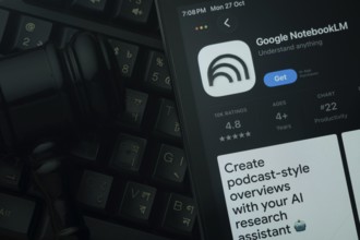 Dhaka, Bangladesh- 28 Oct 2025: An iPad displaying the Goole NotebookLM app against a judge's gavel