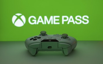 Dhaka, Bangladesh- 19 Sep 2025: A close-up of a white gamepad with the Xbox Game Pass seen on