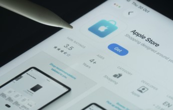 Dhaka, Bangladesh- 30 Oct 2025: Apple Store app on a iPad screen with a pen pointing at the install