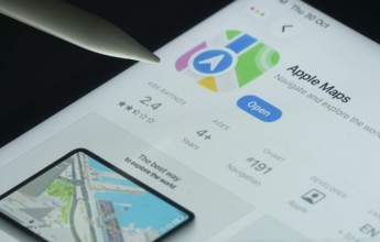 Dhaka, Bangladesh- 30 Oct 2025: Apple Maps app on a iPad screen with a pen pointing at the open