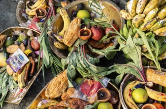 Hindu devotees gather on the banks of the Brahmaputra River to offer prayers to the Sun God on the