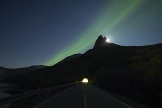 National mountain of Norway - Stetind in the Nordland under auroras and a full moon