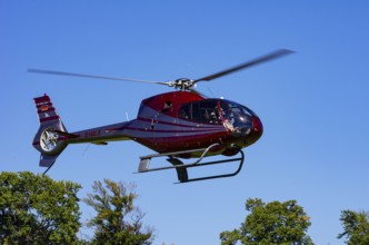 A Eurocopter EC 120B Colibri helicopter, D-HALX registration, during a flight demonstration as part