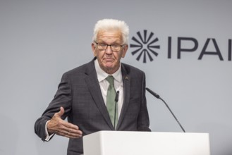 Winfried Kretschmann (Greens), Minister-President of Baden-Württemberg. portrait at the lectern