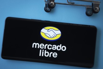 Dhaka, Bangladesh- 03 July 2025: Smartphone screen showing the Mercado Libre logo with shopping