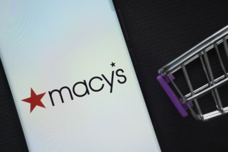 Dhaka, Bangladesh- 03 July 2025: A smartphone displaying the Macy's logo next to a miniature