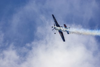 A Jakovlev Jak-55 with the registration LY-AGL during a flight demonstration as part of an air show