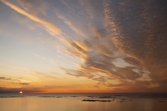 Offshore islands and skerries, sea, dramatically illuminated clouds, sunset, Otroya or Otrøya