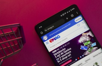 Dhaka, Bangladesh- 03 Oct 2025: A smartphone displaying the Emag website with a shopping cart is