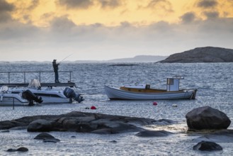 Small bay, archipelago, jetty with angler, Resö Island, Bohuslän, Skagerrak, Sotenäs, Västra
