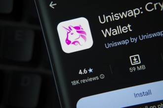 Dhaka, Bangladesh- 27 July 2025: Uniswap app from Google Playstore is displayed on a smartphone