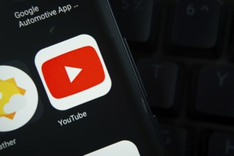 Dhaka, Bangladesh- 27 July 2025: Close-up of smartphone screen showing the youtube app icon with a