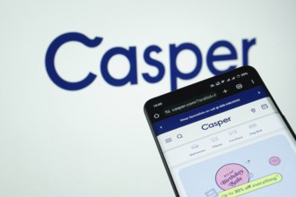 Dhaka, Bangladesh- 03 July 2025: Smartphone displaying Casper web interface against Casper logo