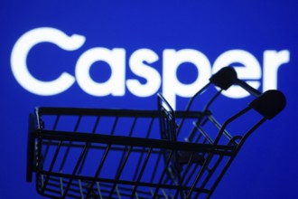 Dhaka, Bangladesh- 03 July 2025: Silhouette of a shopping cart in front of the Casper logo,