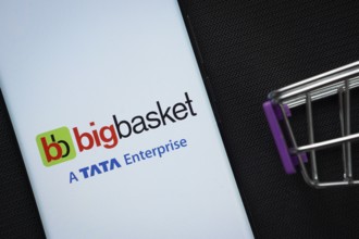 Dhaka, Bangladesh- 03 July 2025: A smartphone displaying the BigBasket logo next to a miniature