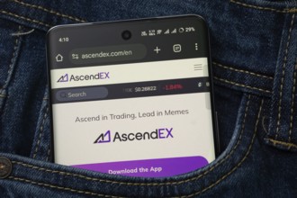 Dhaka, Bangladesh- 15 June 2025: A smartphone displaying the AscendEX web interface peeks out of a