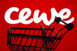 Dhaka, Bangladesh- 03 July 2025: Silhouette of a shopping cart in front of the Cewe logo,