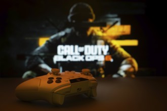 Dhaka, Bangladesh- 06 Sep 2025: A close-up of a white gamepad with Call of Duty Black Ops 6 seen on