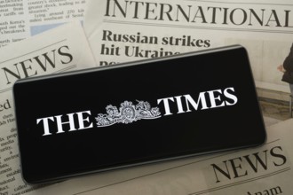 Dhaka, Bangladesh - 18 March 2025: The logo of the times is displayed on a smartphone screen
