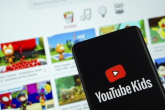 Dhaka, Bangladesh - 06 Sep 2025: The logo of Youtube Kids is displayed on a smartphone screen, and