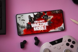 Dhaka, Bangladesh- 06 Sep 2025: A close-up of a gamepad with the Call of duty warzone mobile seen