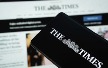 Dhaka, Bangladesh - 18 March 2025: The logo of the times is displayed on a smartphone screen, and