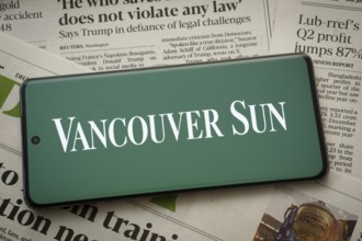 Dhaka, Bangladesh - 18 March 2025: The logo of Vancouver Sun is displayed on a smartphone screen