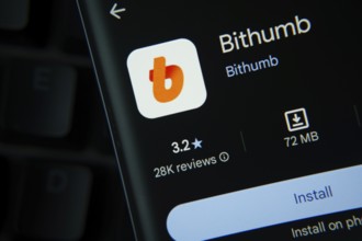 Dhaka, Bangladesh- 27 July 2025: Bithumb app from Google Playstore is displayed on a smartphone
