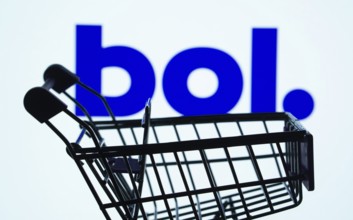 Dhaka, Bangladesh- 03 July 2025: Silhouette of a shopping cart in front of the bol logo,