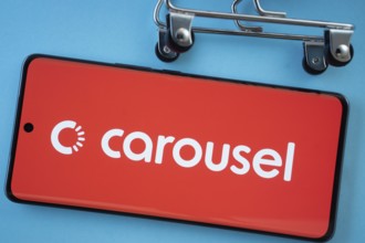 Dhaka, Bangladesh- 03 July 2025: Smartphone screen showing the Carousell logo with shopping cart