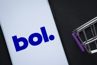 Dhaka, Bangladesh- 03 July 2025: A smartphone displaying the bol logo next to a miniature shopping