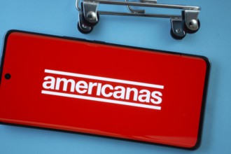 Dhaka, Bangladesh- 03 July 2025: Smartphone screen showing the Americanas logo with shopping cart