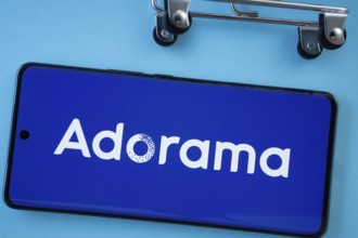 Dhaka, Bangladesh- 03 July 2025: Smartphone screen showing the Adorama logo with shopping cart