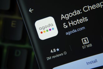Dhaka, Bangladesh- 27 July 2025: Agoda app from Google Playstore is displayed on a smartphone
