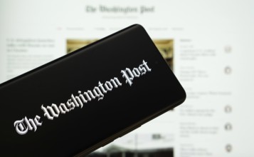 Dhaka, Bangladesh - 18 March 2025: The logo of the wall street journal is displayed on a smartphone