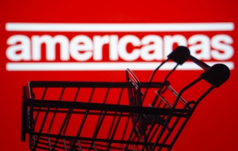 Dhaka, Bangladesh- 03 July 2025: Silhouette of a shopping cart in front of the Americanas logo,