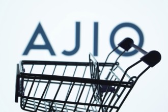 Dhaka, Bangladesh- 03 July 2025: Silhouette of a shopping cart in front of the AJIO logo,