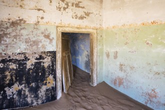 At Kolmanskop, the abandoned ghost town of the diamond days of the early 1900 and of German origin.