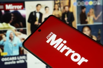 Dhaka, Bangladesh - 18 March 2025: The logo of Daily Mirror is displayed on a smartphone screen,