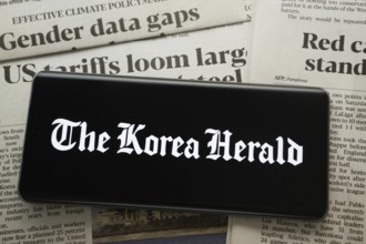 Dhaka, Bangladesh - 18 March 2025: The logo of The Korea Herald is displayed on a smartphone screen