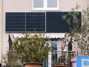 Two solar panels on a house wall in Wuppertal, Germany