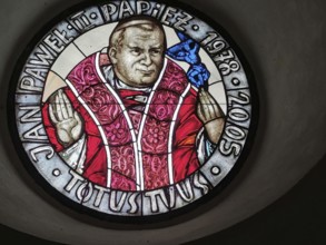 Religious motif, Pope John Paul 2 in a stained glass window in a small Polish village on the