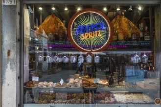 Store window of a small bar with food offerings, Venice, Veneto, Italy