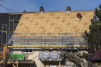Roof insulation of an old apartment building, Bavaria Germany